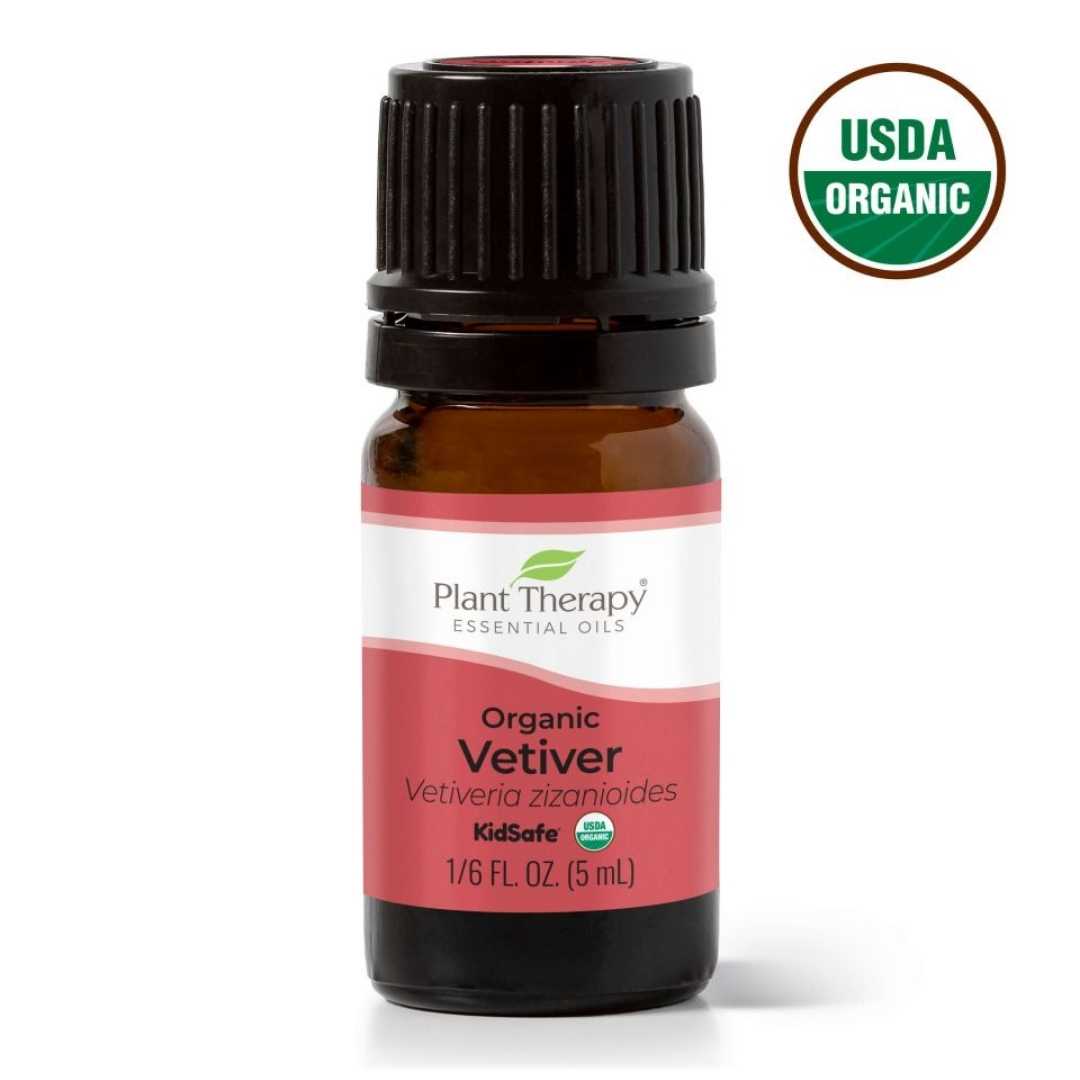 organic vetiver essential oil with certified organic logo on white background