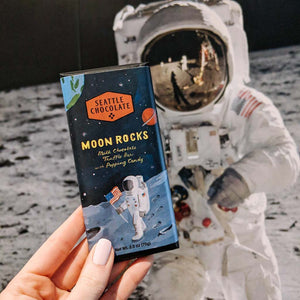 Seattle Chocolate Company, Moon Rocks Milk Chocolate Truffle Bar with Popping Candy. 2.5 oz. Rainforest Alliance Certified Cacao. Non GMO. Kosher. Made in USA.