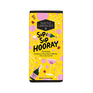 Seattle Chocolate Company, Sip Sip Hooray Pink Bubbly Raspberry Chocolate Truffle Bar with a dark chocolate shell, center of dried raspberries in white chocolate center with all-natural popping candy. Non-alcoholic. 2.5oz. Rainforest Alliance Certified Cacao. Non GMO. Gluten free.