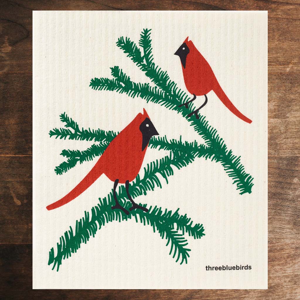 https://shopwhatsgood.com/cdn/shop/products/whatsgood_threebirds_dishcloth_CardinalsOnBoughs_naked_1200x.jpg?v=1667944538